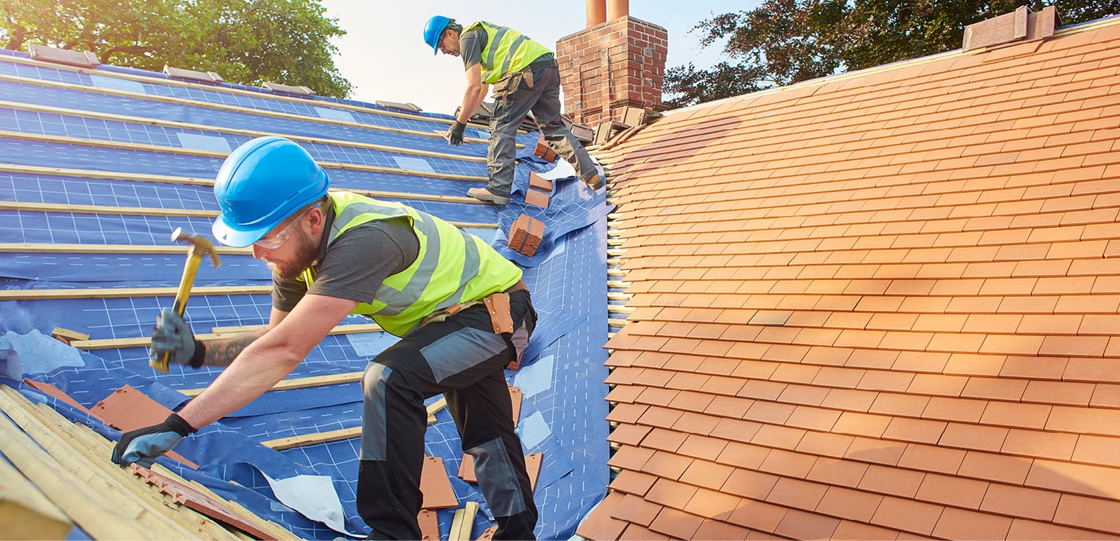 Summit Peak Roofing crew working on a full roof replacement in Edmonton, Alberta